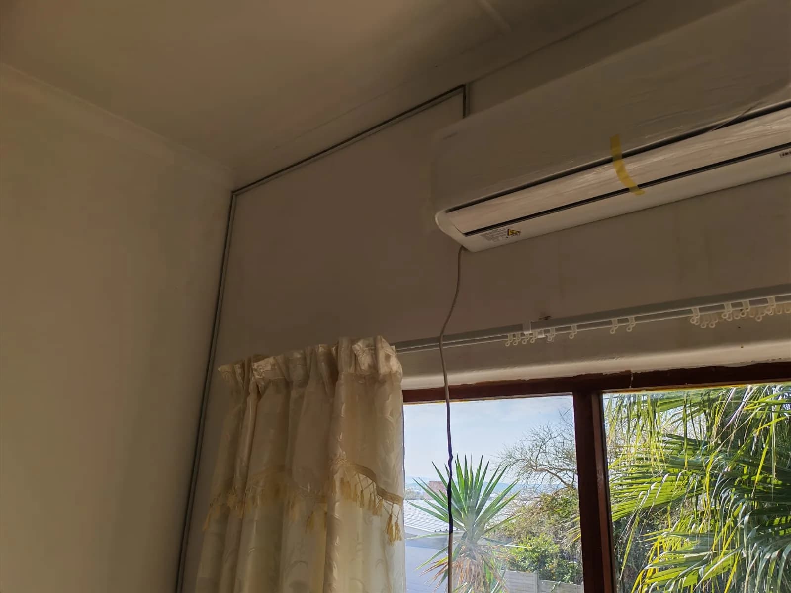 Close interior view of an installed split air-conditioning unit.